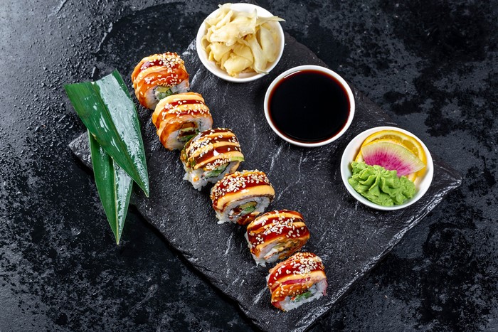 Sushi rolls with soy sauce and wasabi
