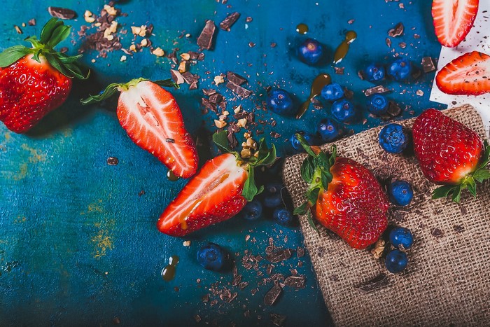 Strawberries and blueberries with chocolate pieces