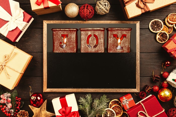 Christmas JOY candles with gifts and ornaments