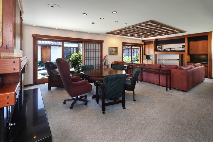 Living room with table, chairs, and sofa