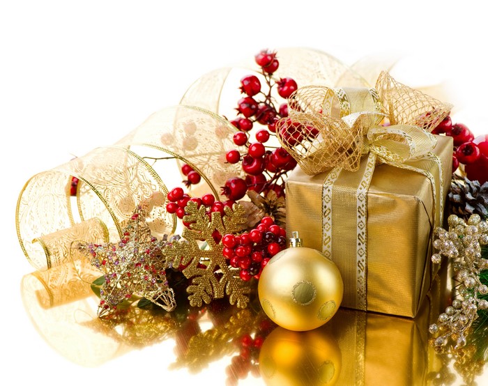 Christmas gift with berries and ornaments