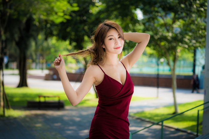 4K Portrait of Woman in Red Dress Outdoors