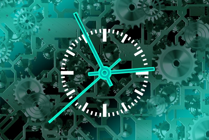 Clock mechanism with gears and clock face