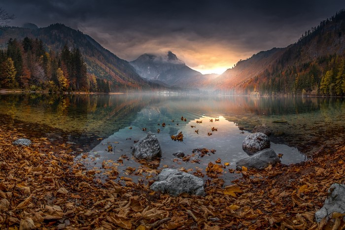 Langbathsee Lake in Austria during Autumn with Mountains and Fog
