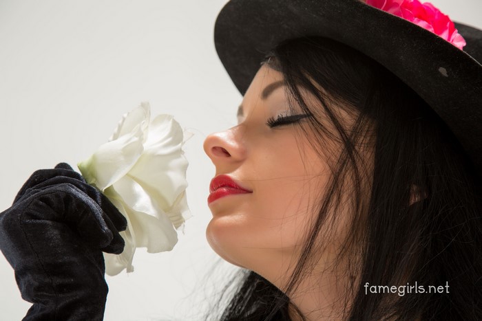 Katie Famegirls with a white rose
