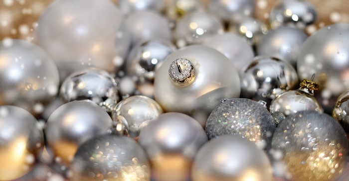 Many silver Christmas balls close up
