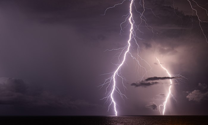 Lightning strikes the Atlantic Ocean at night