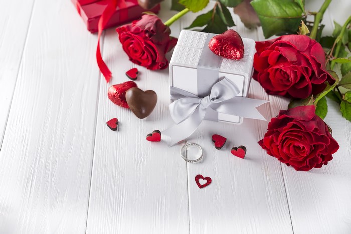 Valentine's Day Roses, Candy, Gift Box, and Ring on Wood