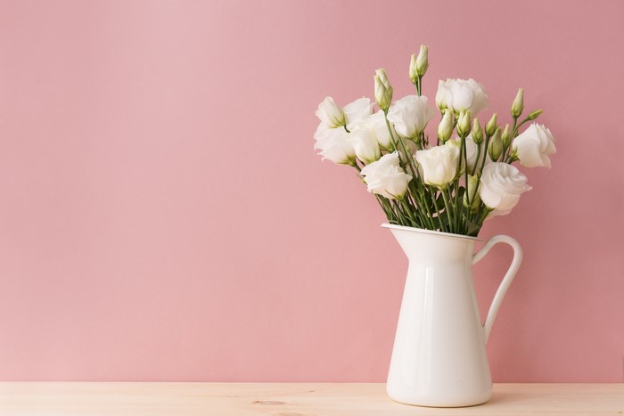White Eustoma Flowers in a White Jug