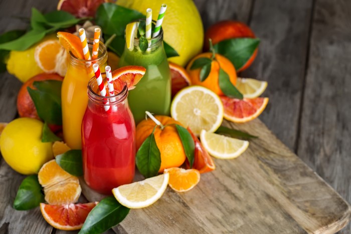 Citrus Juices and Fruits in Bottles
