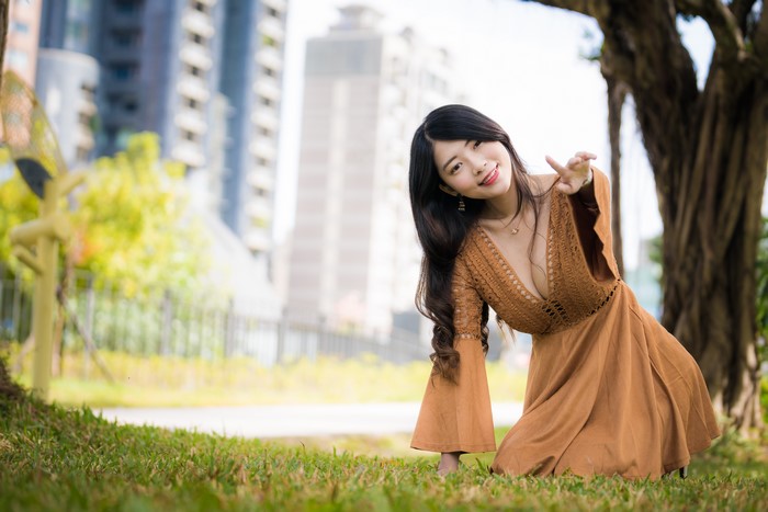 4K Asian Woman in Brown Dress Pose