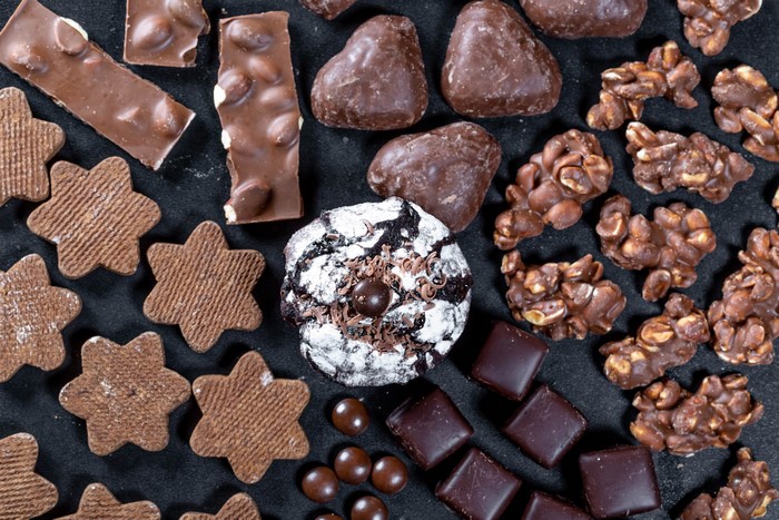 Assortment of chocolate candies and cookies