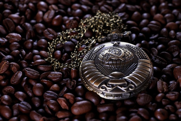 Pocket watch with USSR emblem on coffee beans
