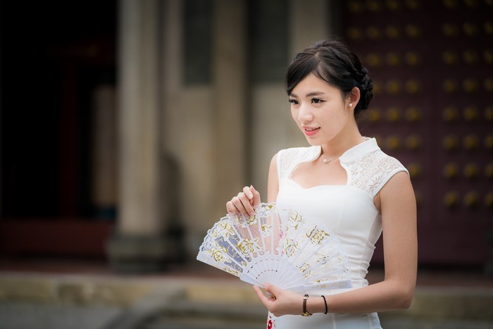 4K Asian Brunette Girl with Hand Fan