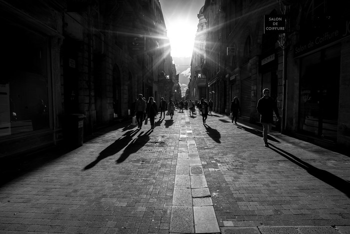 People walking on a street in Bordeaux, France