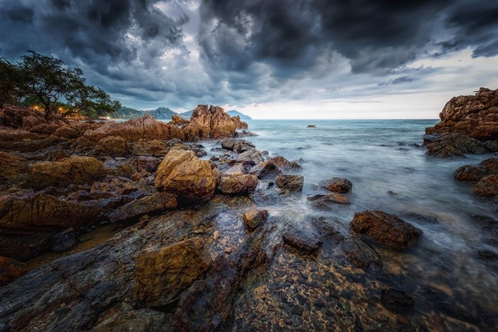 Rocky Coastline with Stormy Skies in Thailand