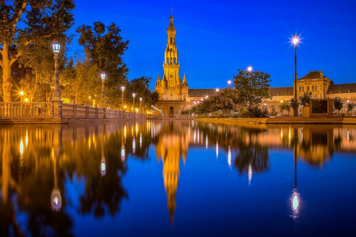 Plaza de España at night with reflection in water