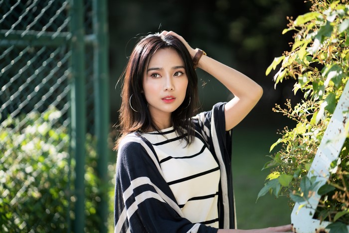 4K Asian Woman Posing with Brown Hair
