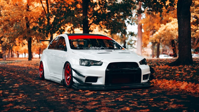 White Mitsubishi Lancer Evolution X Tuning in Autumn