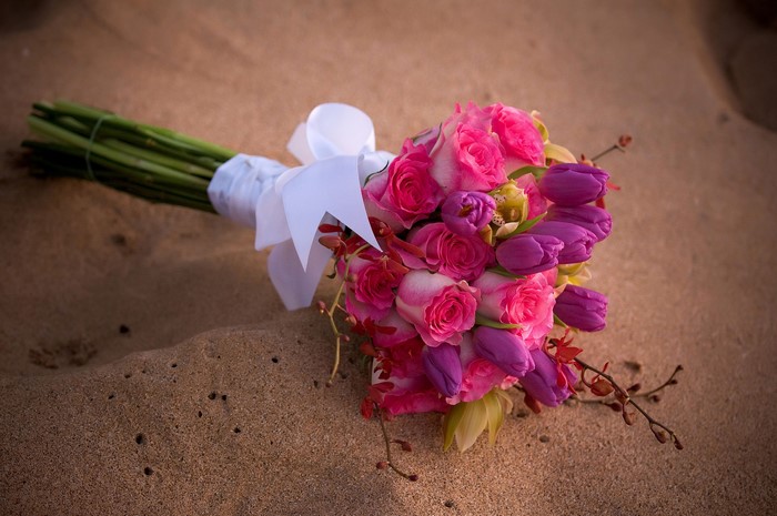 Bouquet of Roses and Tulips on Sand