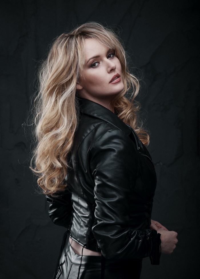 Carla Monaco in a black leather jacket