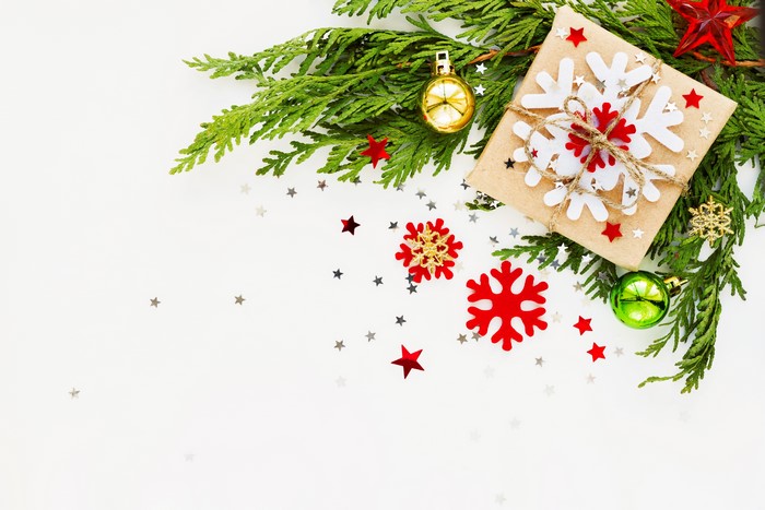 Christmas gift box with snowflakes and branches