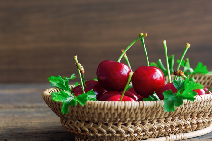 Cherries in a wicker basket