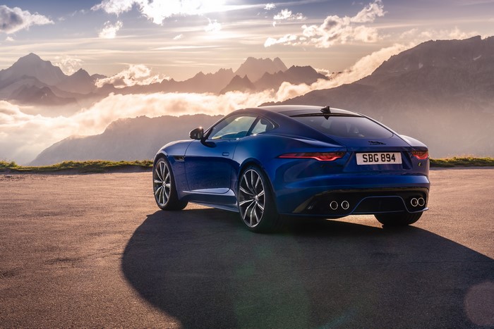 Blue Jaguar F-Type R Coupe in Mountain Landscape 4K
