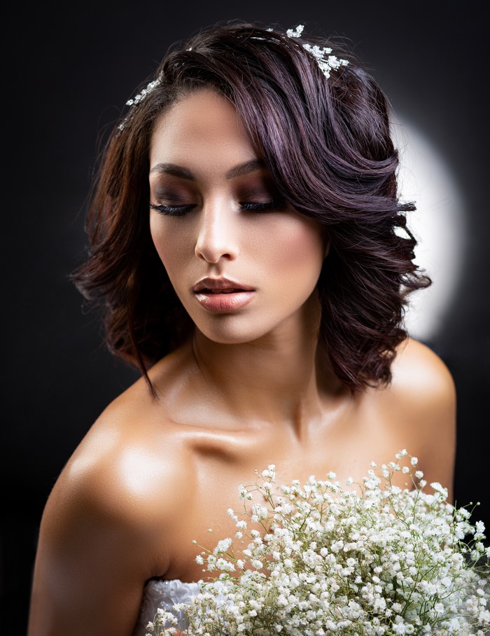 Woman with makeup and flowers