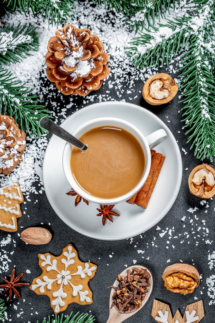 Christmas coffee with cookies and spices