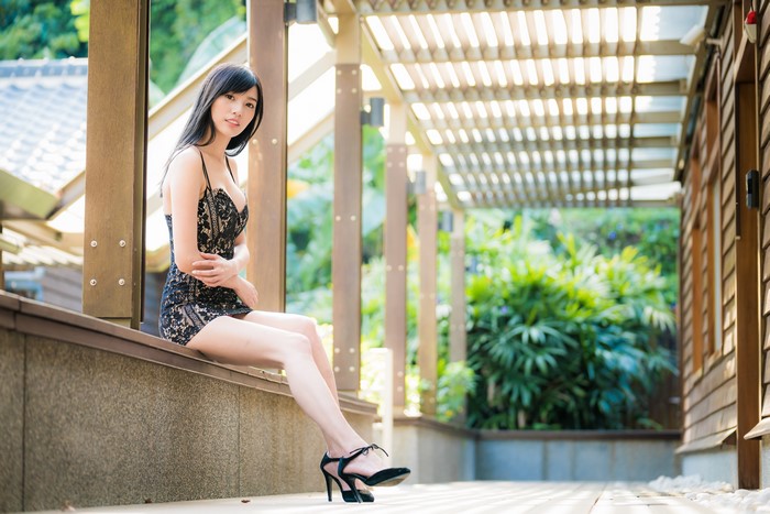 4K Asian Brunette Sitting in Elegant Dress