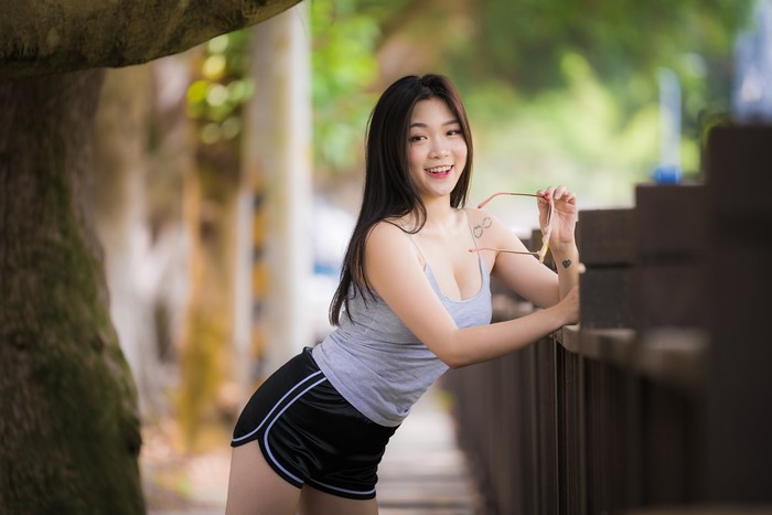 4K Smiling Woman in Shorts and Singlet