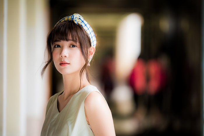 Asian girl with brown hair and headband