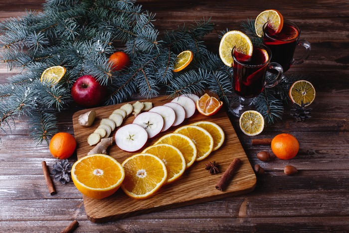 Christmas mulled wine with oranges, apples, and spices