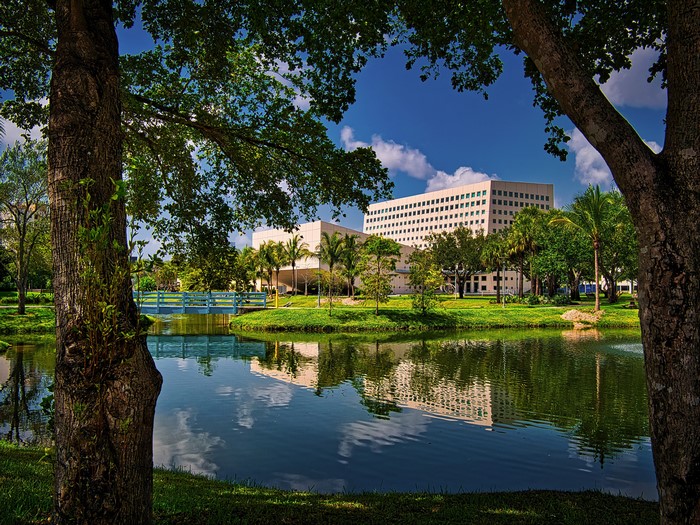 Office buildings and a pond at Florida International University