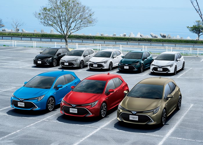 Multiple Toyota Corolla Hatchback cars parked