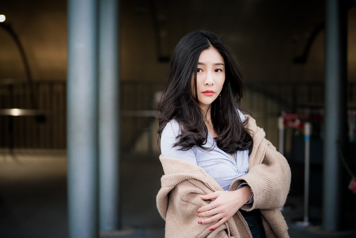 Brunette Asian girl with sweater