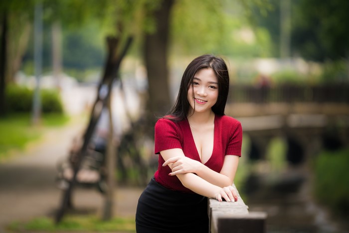 4K Asian Woman Smiling with Bokeh Hands Pose