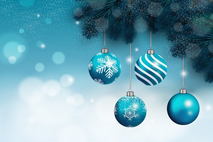 Christmas ornaments on branches with snowflakes