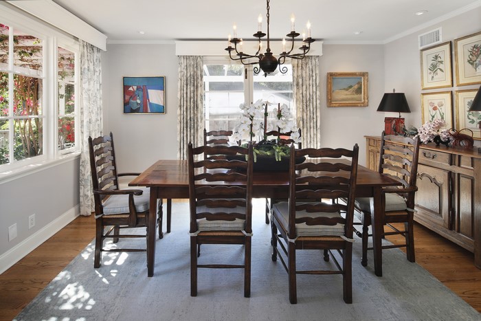 Dining Room with Table, Chairs, and Chandelier