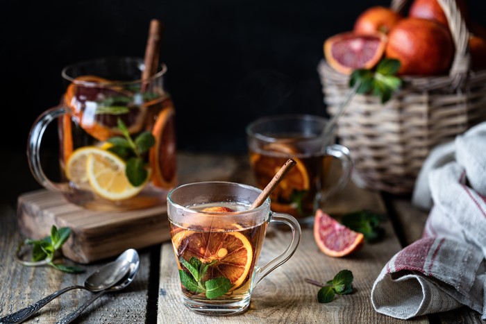 Tea with oranges, lemon, mint, and cinnamon