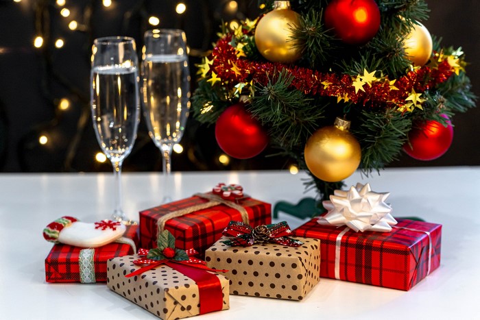 Christmas tree with gifts and champagne