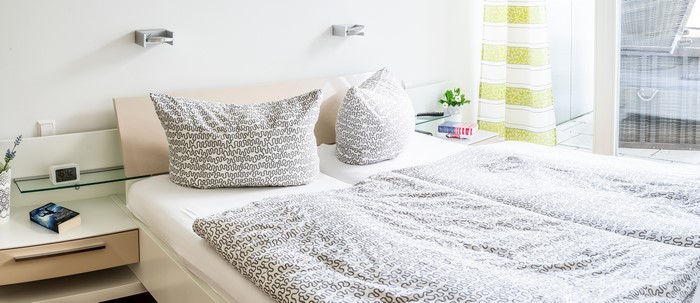 Bedroom with a bed and pillows