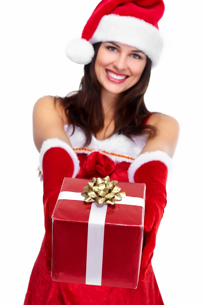 Woman in Santa Hat Holding Christmas Gift