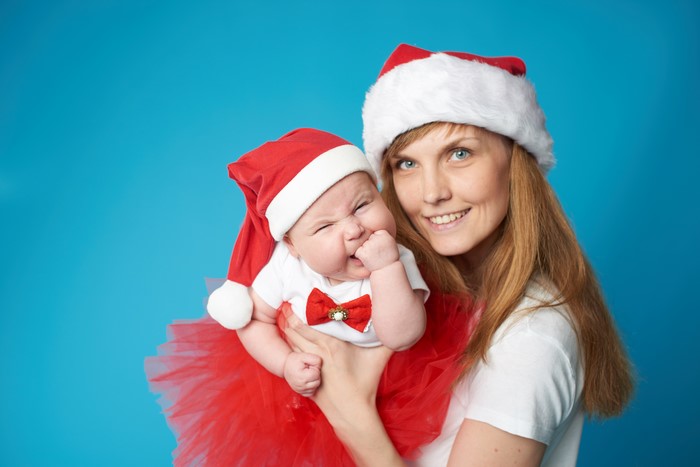 Mother and Baby in Santa Hats