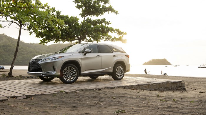 2020 Lexus RX 450hL on a beach boardwalk