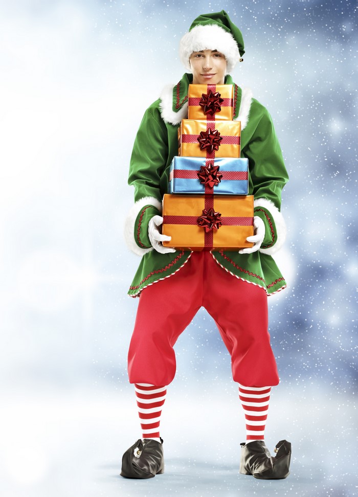 Elf holding stack of Christmas gifts