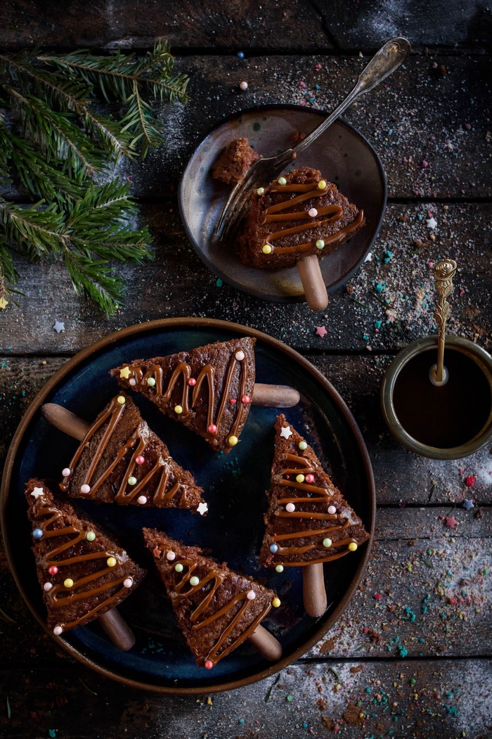 Christmas tree shaped chocolate cakes with sprinkles