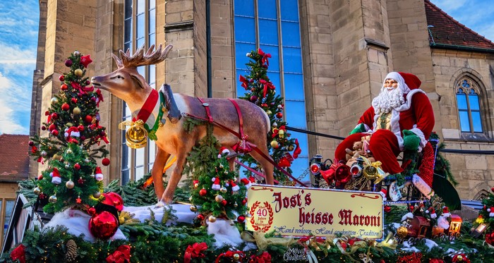 4K Santa Claus on a Sleigh with Reindeer and Christmas Trees