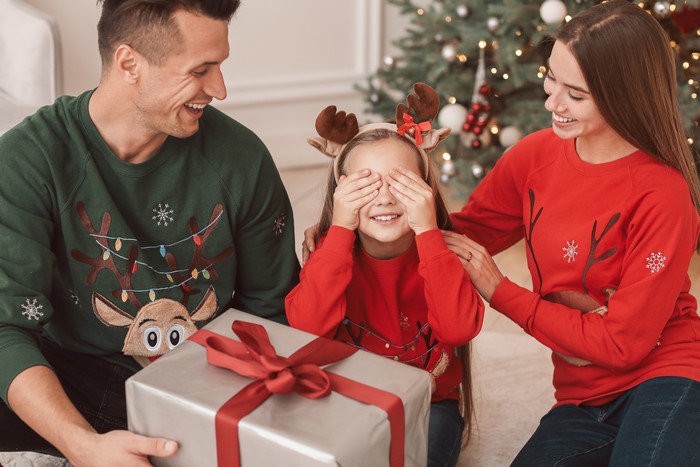 Family with Christmas Gift